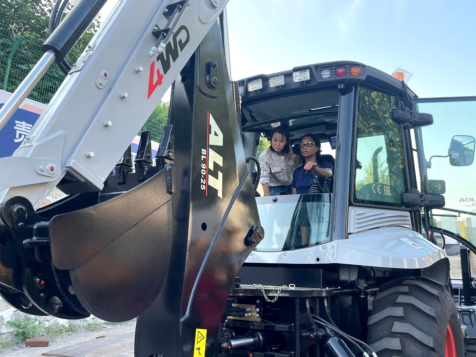 Client getting the hang of it — backhoe loader