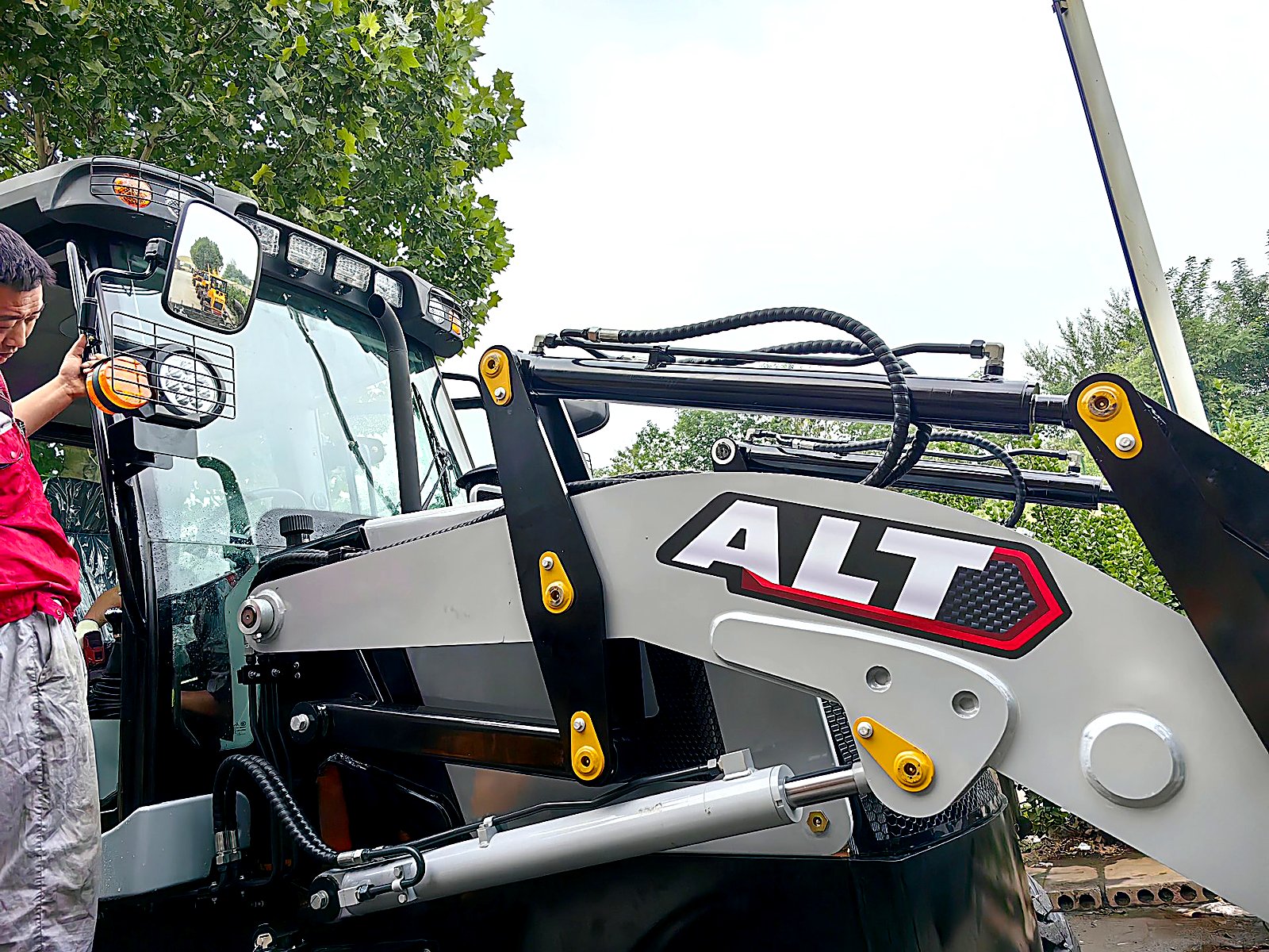 Backhoe loader bucket and attachment inspection