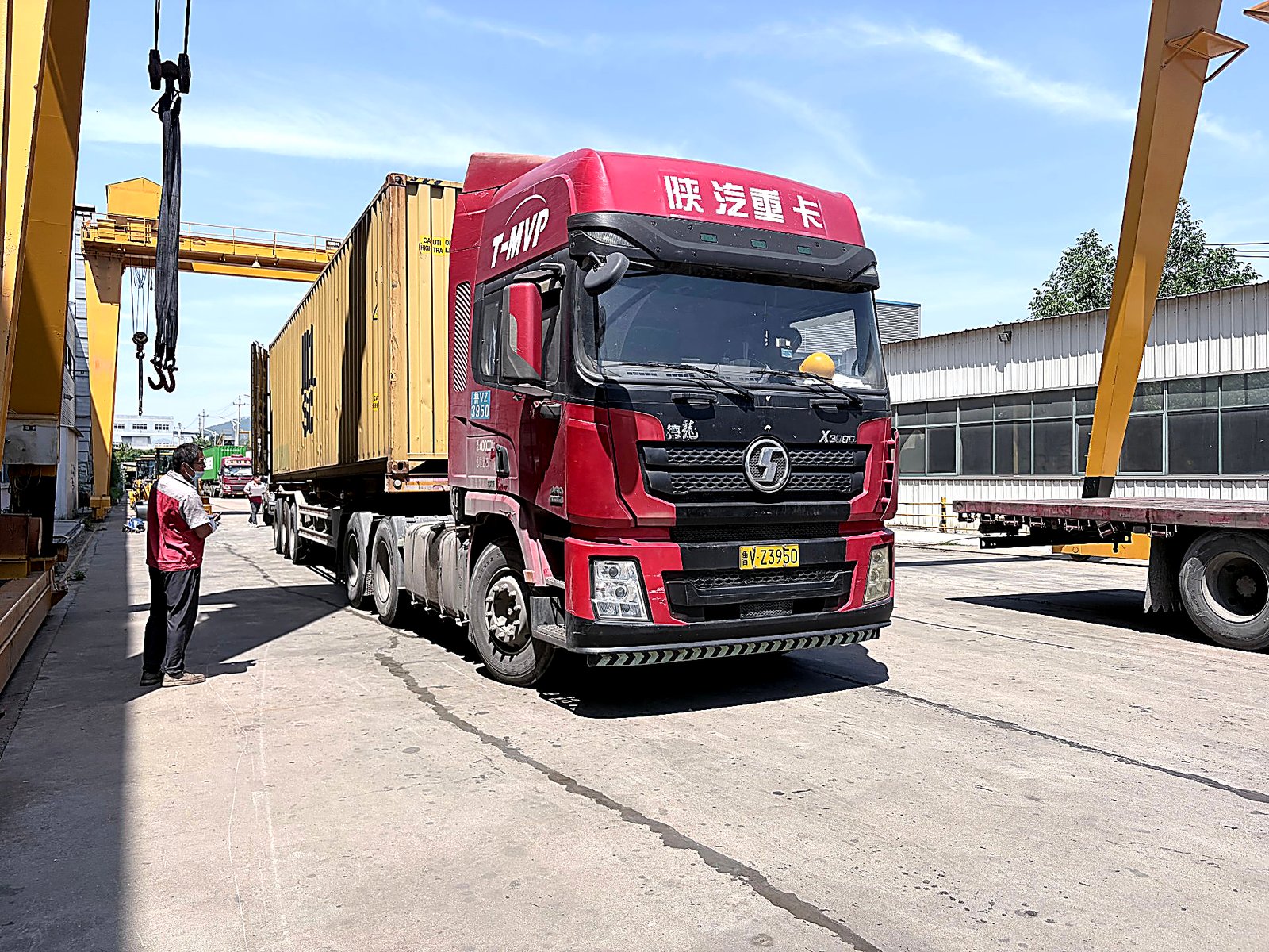 Backhoe loader being prepared for export shipment